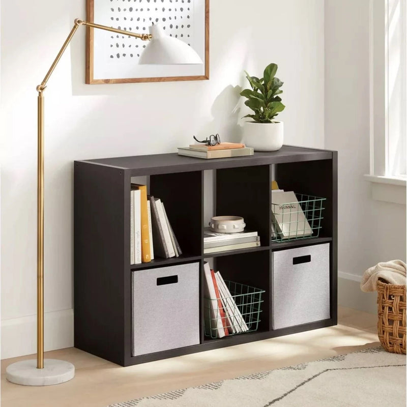Load image into Gallery viewer, A modern home setting with a black shelving unit featuring two gray Brightroom™ fabric bins, providing a neat storage solution in a living space.
