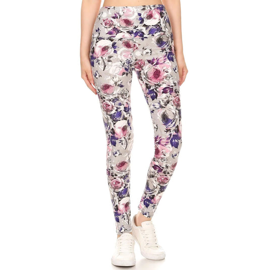 Front view of high-waist yoga-style leggings with a detailed pink and purple floral print on a gray background, offering a stretchy fit for active wear.