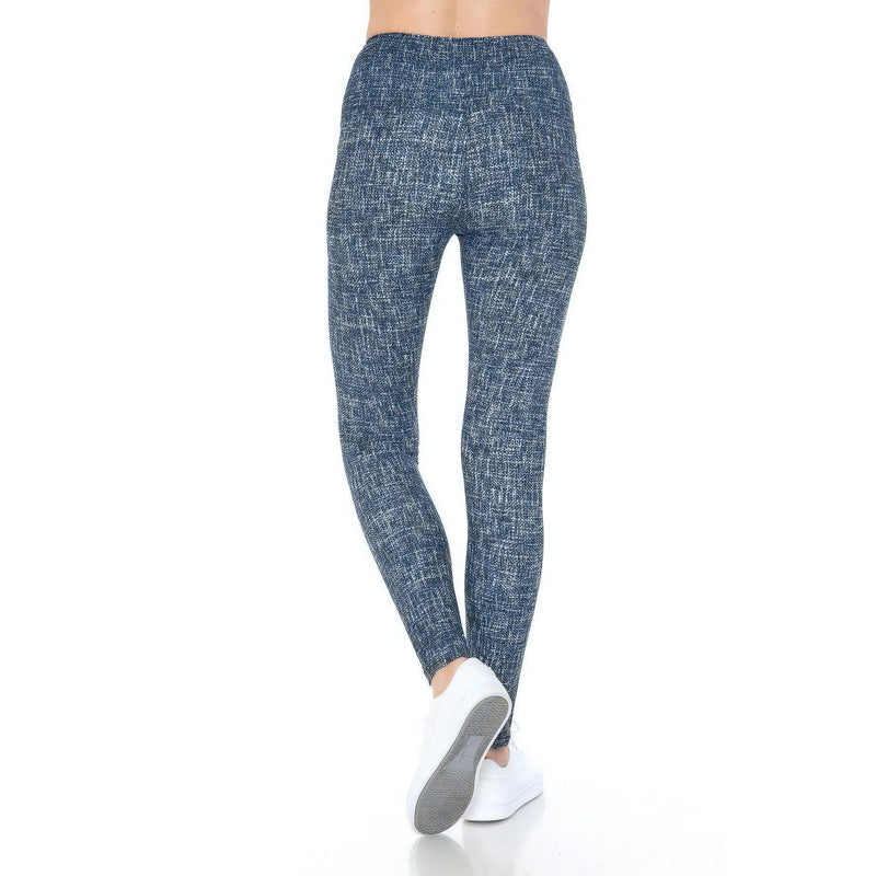 Load image into Gallery viewer, Rear view of high-waist yoga leggings with a blue multi-print design, showcasing the snug fit that offers both support and style.

