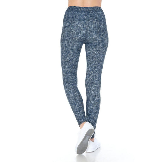Rear view of high-waist yoga leggings with a blue multi-print design, showcasing the snug fit that offers both support and style.