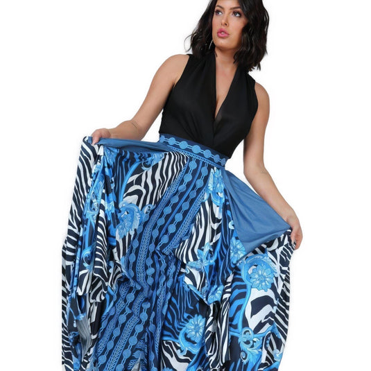Close-up of the detailed animal chain print on a denim maxi skirt, highlighting the intricate pattern and bold blue and black colors.