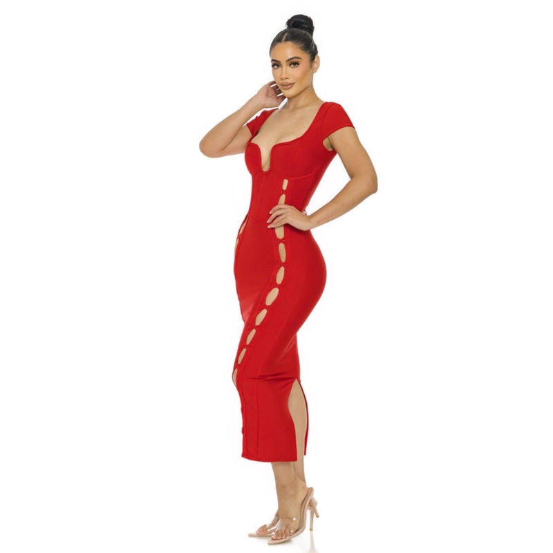 Load image into Gallery viewer, Side angle of a red Bandage Midi Slit Bodycon Dress highlighting the cinched waist, faux lace-up sides, and mid-calf slit, accessorized with nude heels.
