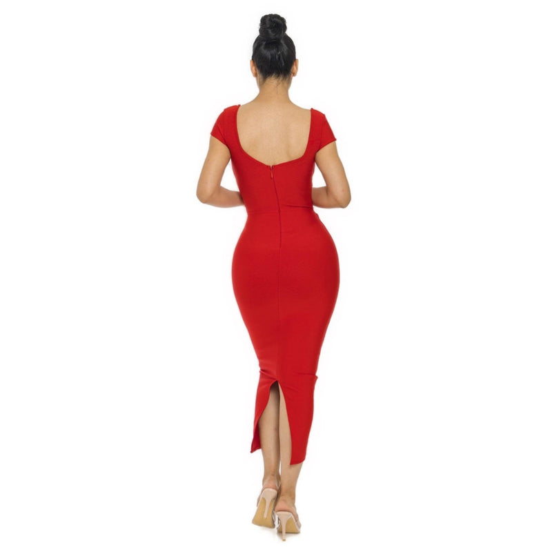 Load image into Gallery viewer, Rear view of a red Bandage Midi Slit Bodycon Dress, illustrating the seamless zipper closure, figure-accentuating fit, and back slit, worn with beige heels.
