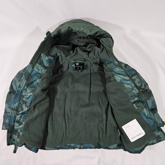 Interior view of the boys' green camo puffer coat, displaying the soft lining and the label, ensuring comfort and brand authenticity.