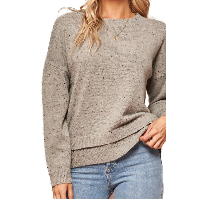 Load image into Gallery viewer, Close-up of a cozy oatmeal flecked knit sweater with a crew neckline and long sleeves, highlighting the texture.
