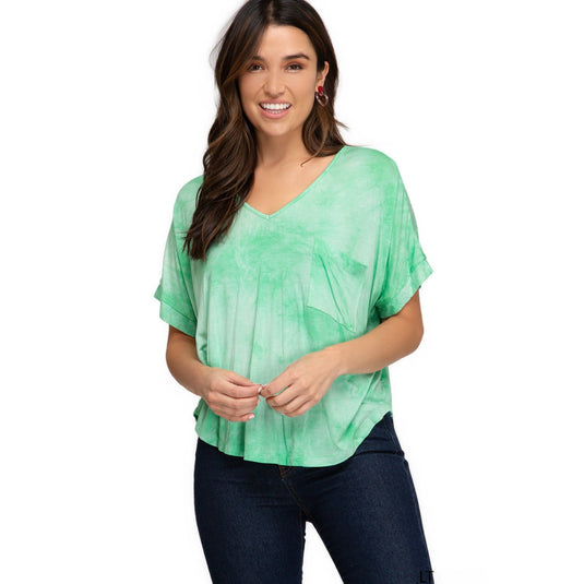 Fresh and vibrant light green tie-dye top with a V-neck and pocket detail, offering a breezy and comfortable fit for everyday wear.
