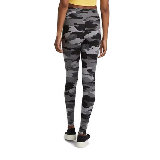 Rear view of a woman highlighting the figure-flattering design of Wild Fable's grey camo high-waisted leggings, perfect for a sporty-chic look.