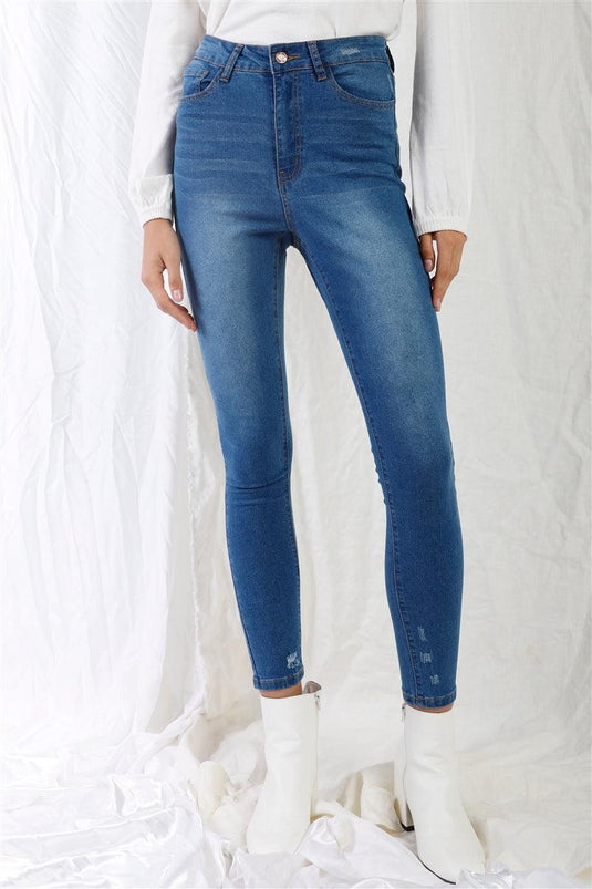 Mid Blue High-Waisted Skinny Denim Jeans with Rips Shop Now at Rainy Day Deliveries
