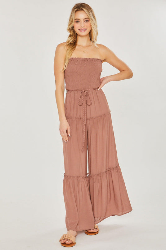 Sleeveless Woven Solid Smocked Ruffle Jumpsuit Shop Now at Rainy Day Deliveries