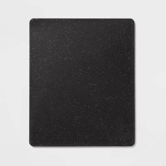 Top-down view of the black polygranite cutting board, highlighting its ample 14x17 size and speckled texture, perfect for any culinary task.