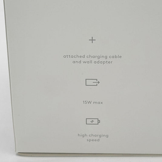 Close-up of the product box highlighting the MagSafe charging stand's features: an attached charging cable and wall adapter, 15W max power, and high charging speed.