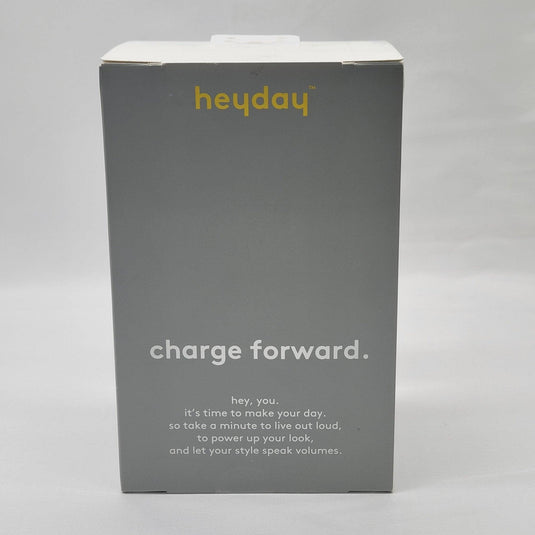 Packaging box for Heyday MagSafe wireless charging stand with text 'charge forward' on a gray background, indicating style and functionality.