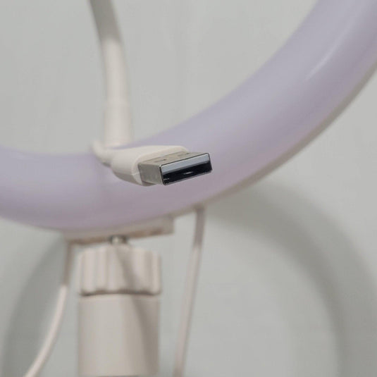 Detail view of the Heyday ring light's USB power connection point, showcasing the ring's thin profile and clean design.
